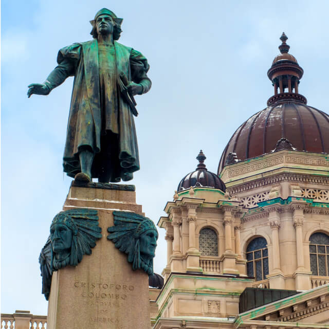 A statue for Christopher Columbus stands before the Onanadaga County Courthouse in Syracuse NY