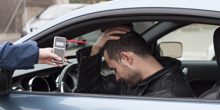 Concerned driver getting a alcohol in blood test from the police