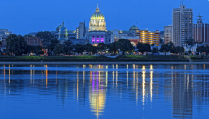 The Harrisburg Pennsylvania skyline with the state capital building and the Susquehanna River.