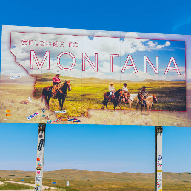 Montana sign on the road on sunny day