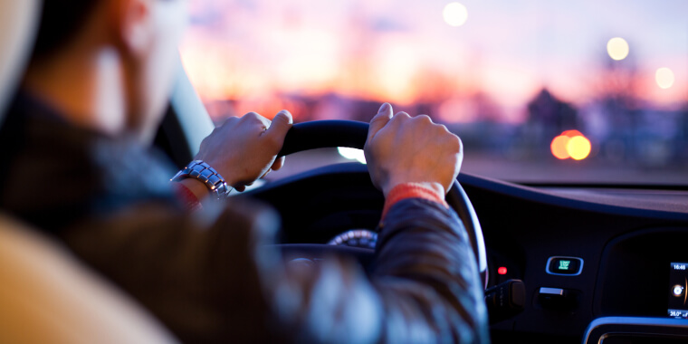 Man driving a car in the afternoon