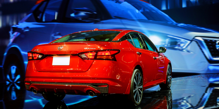 Back view of Red Nissan Altima car