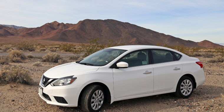Lateral view of white Nissan Sentra
