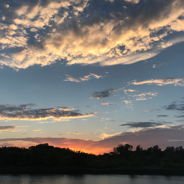 Sunset reflecting off lake in Grand Prairie, Texas