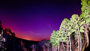 Photograph of a sunset and milky way in Batesville, Arkansas in the foothills of the Ozark Mountains