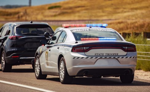 A state trooper pulls over a driver