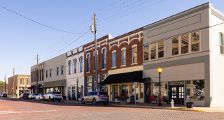 Streets of Downtown Gainesville with Shops, Dining, and Parking: The Front Porch of Texas cheap car insurance in the Lone Star State.