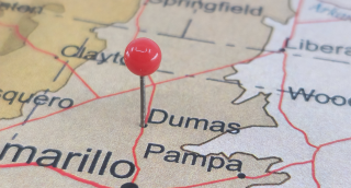 Dumas marked on a Texas Road Map with a Green Pin: Dumas cheap car insurance in Texas.