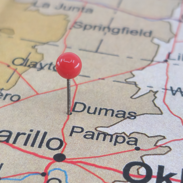 Dumas marked on a Texas Road Map with a Green Pin: Dumas cheap car insurance in Texas.