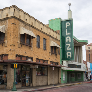 Street view of the Plaza Theater built in 1950 in Laredo, Texas. Cheap car insurance in The Lone Star State.