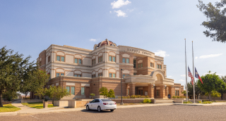 Zapata County Courthouse on a sunny day. – Zapata, cheap car insurance in Texas.