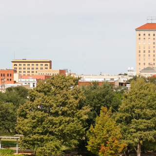 Sunny urban landscape of San Angelo, West Texas, on a summer day - Cheap car insurance in Texas.
