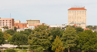 Sunny urban landscape of San Angelo, West Texas, on a summer day - Cheap car insurance in Texas.