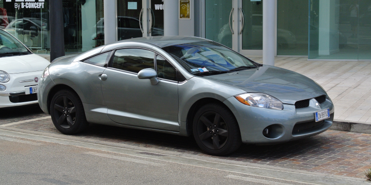 Mitsubishi Eclipse sports car pictured on the city street in summer, Jesolo, Italy. 