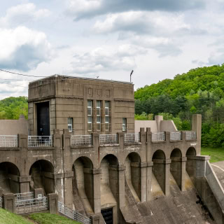 Dover, Ohio/USA-May 16, 2019: Panorama of the concrete Dover Dam that was built in 1935 by the Army Corp of Engineers on the Tuscarawas River for flood control, water conservation and navigation.