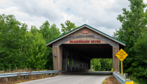 Bridge # 35-32-21 Blanchard River covered bridge was built in 2009 in Pratt truss style. It crosses Blanchard River on Township Highway 241 near Findlay and is open to two lanes of traffic.