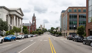 A view down a wide street in downtown Wilmington – cheap car insurance in North Carolina.