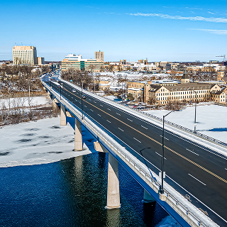Traffic over the bridge that heads into the city of Appleton - cheap car insurance in Wisconsin.