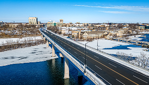Traffic over the bridge that heads into the city of Appleton - cheap car insurance in Wisconsin.