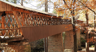 The Clarkson–Legg Covered Bridge, more simply known as Clarkson Covered Bridge, is a county-owned wooden covered bridge that spans Crooked Creek in Cullman County – cheap car insurance in Alabama.