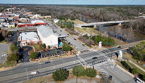 River Intersection Drone Shot Albany South Georgia Flint River showing cars driving safely. No car accidents.