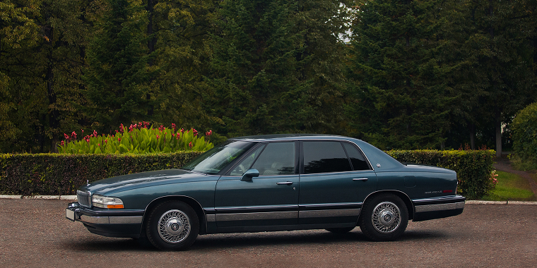 American business car Buick Park Avenue Ultra in the park – cheap car insurance