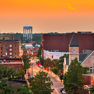 Columbia, Missouri, USA downtown city skyline at twilight.