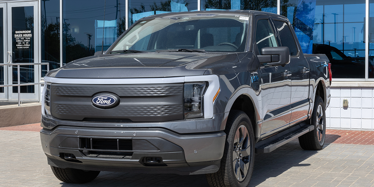 Fishers - September 28, 2025: Ford F-150 Lightning 4X4 Supercrew EV display. Ford offers the F150 Lightning with up to 320 miles of driving range.