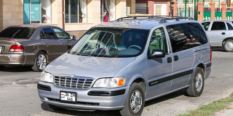 Atyrau, Kazakhstan - October 4, 2022: Grey minivan Chevrolet Venture in the city street. – Chevrolet Venture, cheap car insurance.