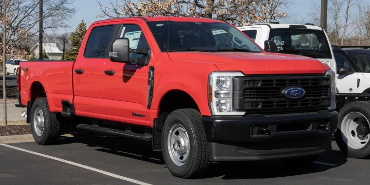 Ford F-350 SRW Crew Cab XL pickup at a dealership. Ford offers the F350 with a 6.7L Powerstroke Diesel engine. MY:2025. Cheap car insurance. 