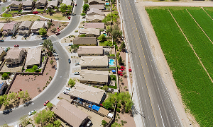 Aerial view of a residential neighborhood with homes and streets in Avondale, Arizona – cheap car insurance in Arizona.