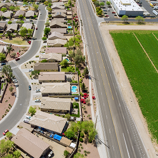 Aerial view of a residential neighborhood with homes and streets in Avondale, Arizona – cheap car insurance in Arizona.