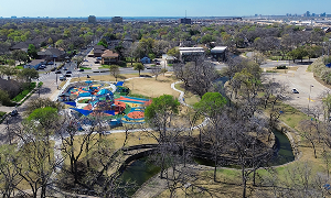 Colorful outdoor playground with climbing structures in Spring, Texas – cheap car insurance in Texas.