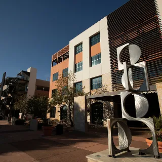 Afternoon sunlight shines on the public city Civic Center and City Hall of Surprise, Arizona.