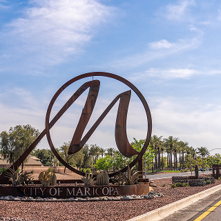14-foot-tall stylized “M” monument sits at the north entrance to the city on the median of John Wayne Parkway, State Route 347. – cheap car insurance in Maricopa, AZ.